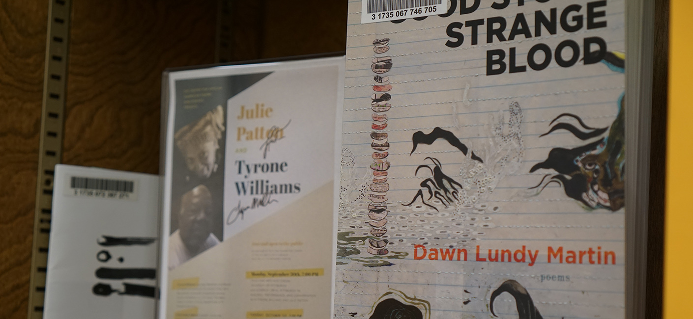 Among the works highlighted in the Hillman Library ground floor display of the Center for African American Poetry and Poetics are signed event posters and books by Pitt faculty members and CAAPP visiting fellows.
