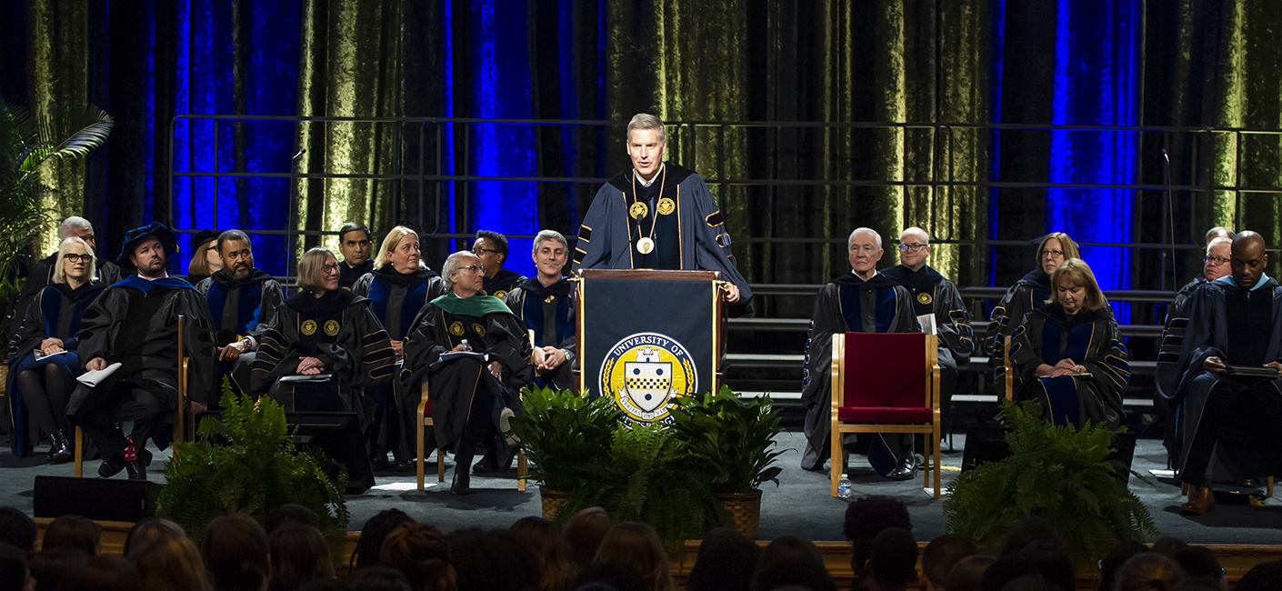Chancellor Patrick Gallagher at Honors Convocation podium.