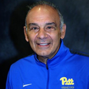 Pat Pecora in a blue athletic jacket